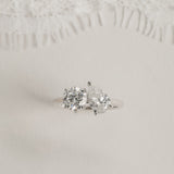 Round and Pear Toi et Moi lab-grown diamond ring in white gold on cream silk