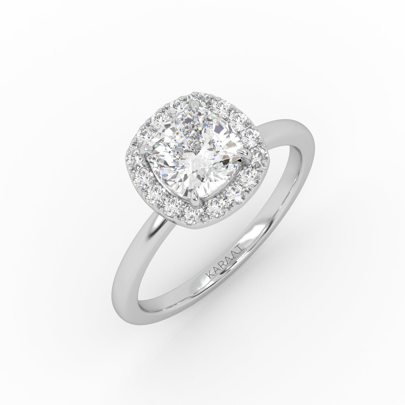 A white gold cushion-shaped solitaire engagement ring showcasing a brilliant 1 carat lab-grown diamond in halo setting.