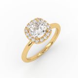 A timeless cushion solitaire engagement ring with a sparkling center diamond and yellow gold band.