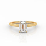 Emerald Solitaire engagement ring, made of 1-carat lab-grown diamond and 18k yellow gold.