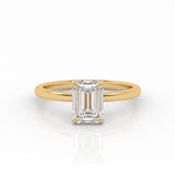 Emerald Solitaire engagement ring, made of 1-carat lab-grown diamond and 18k yellow gold.